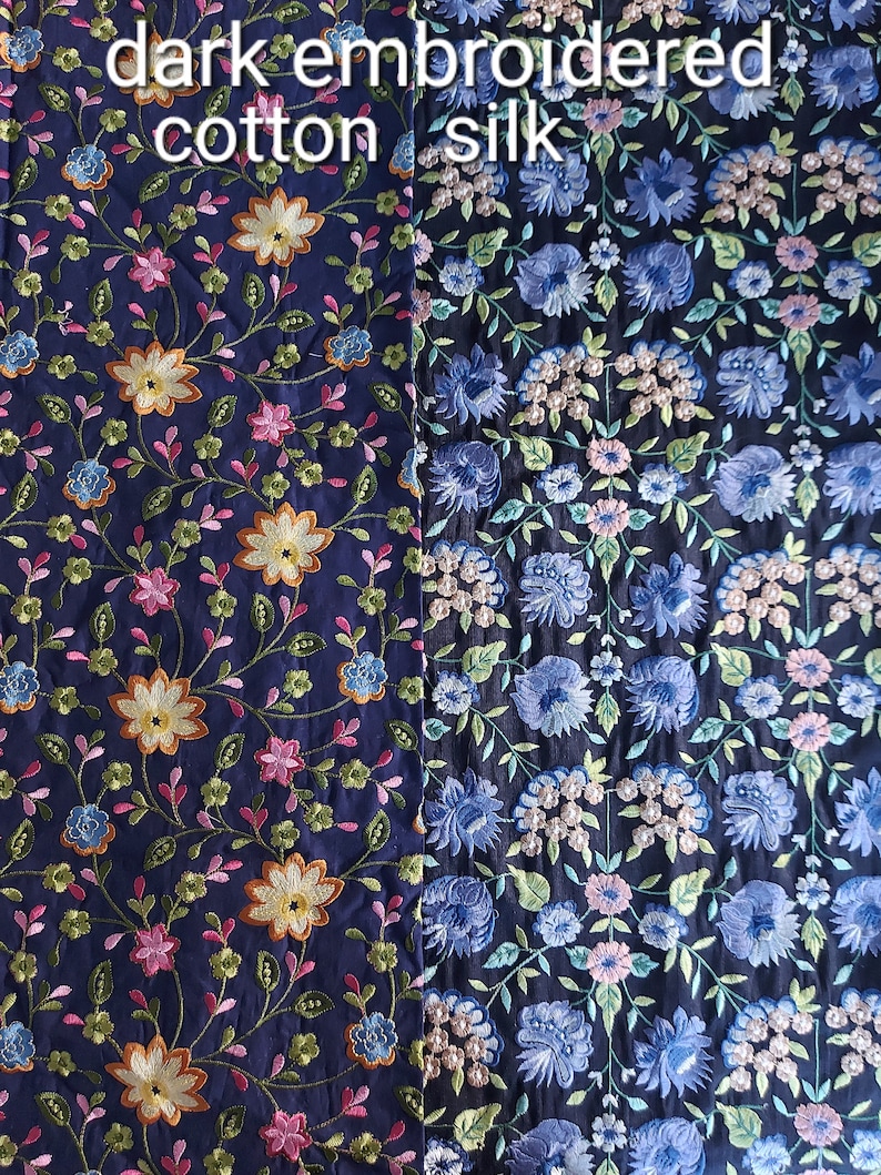 May include: Two fabric swatches with dark blue backgrounds and floral embroidery. The left swatch is labeled "dark embroidered cotton" and the right swatch is labeled "silk".