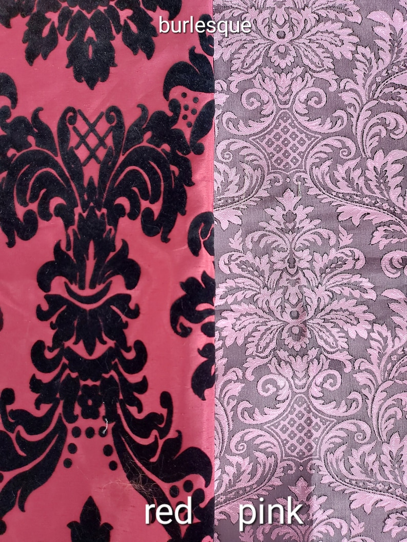 May include: Two fabric swatches with a damask pattern. The left swatch is red with a black pattern. The right swatch is pink with a gray pattern. The word "burlesque" is written above the swatches. The word "red" is written below the left swatch and the word "pink" is written below the right swatch.