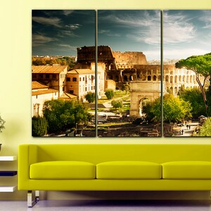 May include: A panoramic view of the Colosseum in Rome, Italy. The ancient Roman amphitheater is surrounded by trees and buildings. The sky is cloudy with a hint of sunshine.
