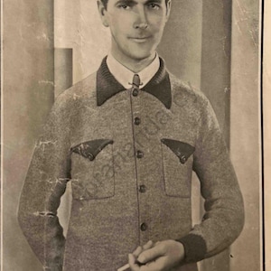 May include: A black and white photo of a man wearing a gray knitted sweater with a dark collar and two flap pockets. The sweater has a button closure and a ribbed hem. The man is holding a cigarette in his right hand. The text "LUMBER JACKET - "GEORGE" DESIGN" is at the bottom of the image. The text "PATON'S & BALDWINS" is in the top right corner of the image.