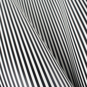 May include: Black and white striped fabric with a folded, wavy pattern.