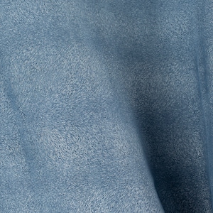 May include: A close-up of a blue fabric with a textured, fuzzy surface.