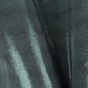 May include: A close-up of a teal-coloured fabric with a textured, diamond-shaped pattern. The fabric is draped and folded, creating a soft, flowing look.