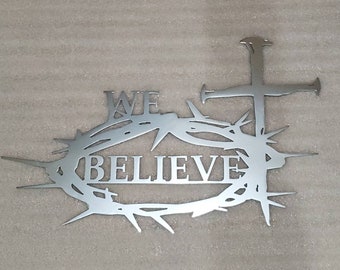 We Believe Metal Sign with Crown of Thorns and Nails in Shape of the Cross