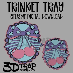 May include: Digital download design for a trinket tray. The design features a light blue background with a purple bow adorned with white stars and pink cherries. The text "TRINKET TRAY" and "STL/3MF DIGITAL DOWNLOAD" are at the top.