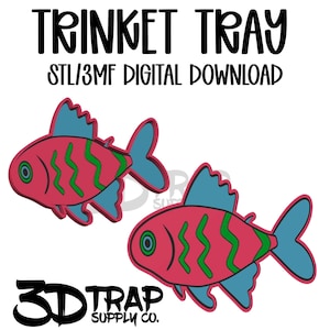 May include: A digital download image featuring two cartoon fish in a trinket tray design. The fish are red with green and blue accents. The text "TRINKET TRAY" and "STL/3MF DIGITAL DOWNLOAD" are at the top. The logo "3D TRAP SUPPLY CO." is at the bottom.