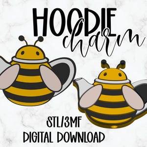 May include: A digital download graphic featuring two bee-themed teapot designs. The teapots are yellow and black striped with gray accents, resembling bees. The text "HOODIE charm" and "STL/3MF DIGITAL DOWNLOAD" are displayed in black.