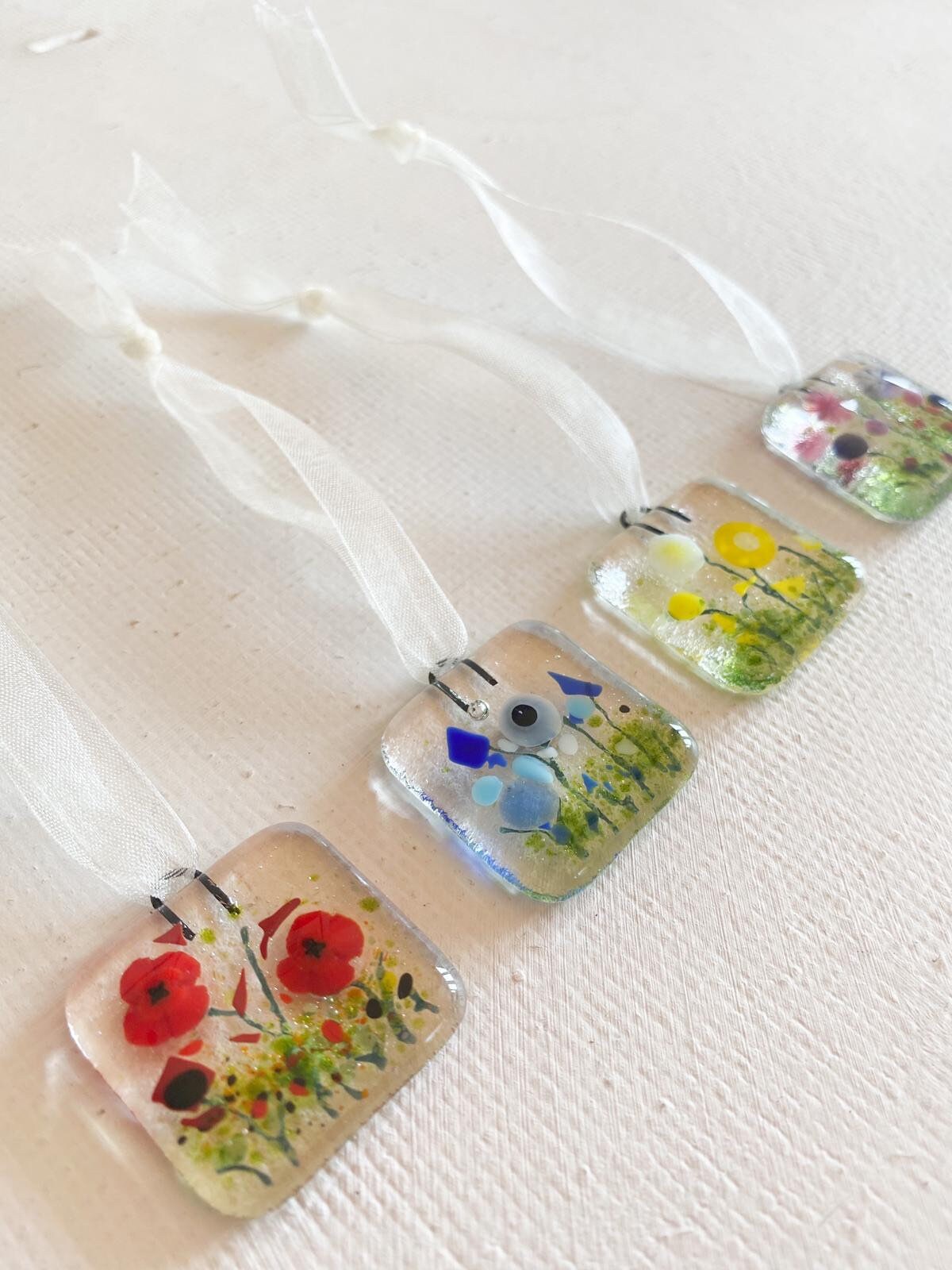 X4 fused glass flower meadow ornaments in red blue yellow and pink