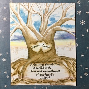 May include: A watercolor painting of a tree with two intertwined hearts in the trunk. The hearts are inscribed with the names "Jessica + Dominic". The text below the tree reads "A family's foundation is rooted in the love and commitment of two hearts. 02-28-15" and is signed "M. Scharsi-Douslas".