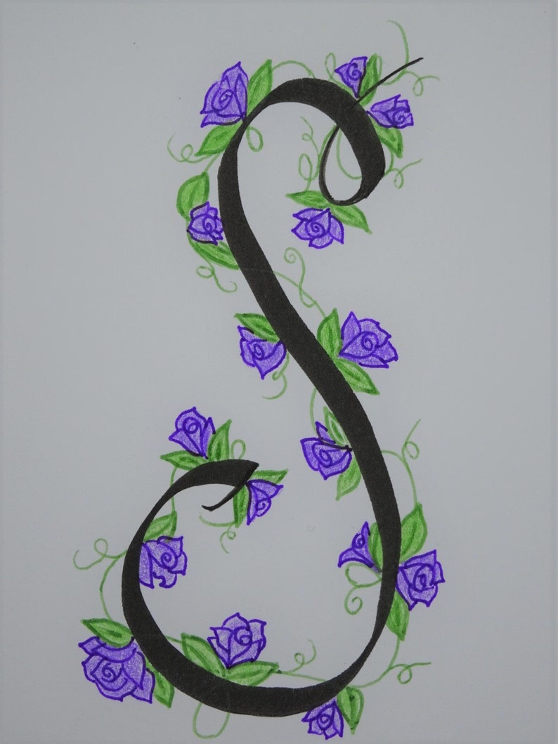 May include: A black calligraphic letter S with a vine of purple flowers and green leaves winding around it.