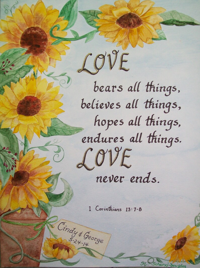 May include: Watercolor painting of sunflowers with a quote about love from 1 Corinthians 13:7-8. The quote reads "LOVE bears all things, believes all things, hopes all things, endures all things. LOVE never ends." The painting is signed "Cindy & George 5-24-14" and "M. Scharyj-Douglas".