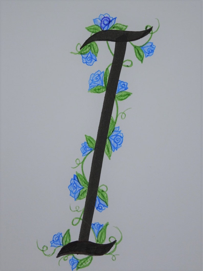 May include: A black calligraphic letter I with a vine of blue flowers and green leaves winding around it.