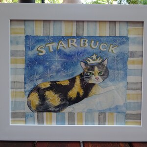 May include: A watercolor painting of a calico cat wearing a gold crown. The cat is sitting on a cloud with a blue starry background. The word "STARBUCK" is written in gold letters at the top of the painting.