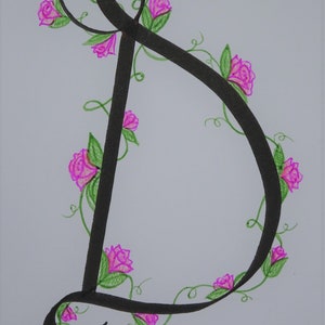 May include: A black calligraphic letter D with a vine of pink flowers and green leaves winding around it.