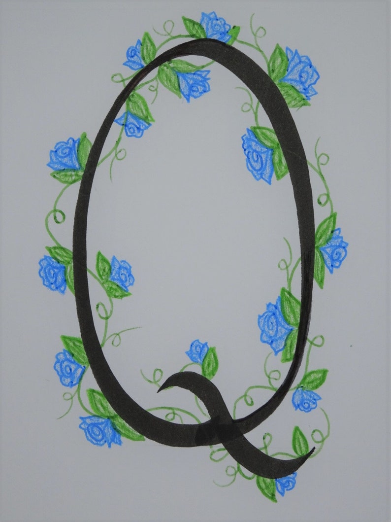 May include: A black calligraphic letter Q with a decorative border of blue roses and green vines.