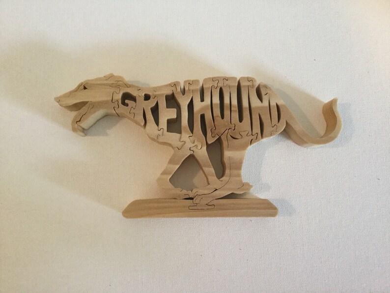 Wooden Greyhound dog puzzle.