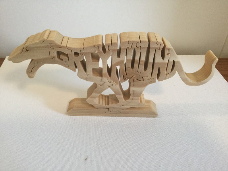 Wooden Greyhound dog puzzle.