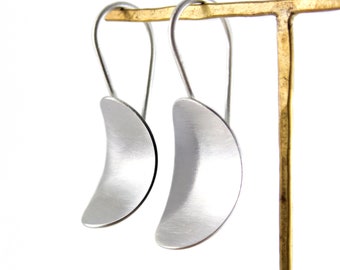 Modern brushed earrings. Silver dangle earrings. Oval silver earrings. Contemporary earrings. Unusual silver earrings. Long silver earrings