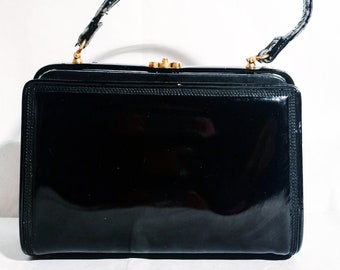 Elegant shiny black vintage bag from the 60s