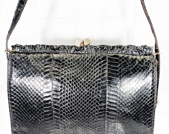 Pochette vintage originale en peau de serpent des années 1970