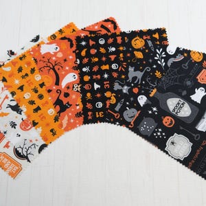 May include: A set of five square fabric swatches featuring Halloween-themed patterns in orange, black, and white. The designs include ghosts, pumpkins, black cats, spider webs, and potion bottles with text such as Spooky Potion and Eat Drink and Be Scary.