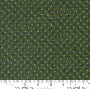 Peut inclure: Tissu vert avec un motif r&eacute;p&eacute;titif de cercles bleu fonc&eacute; avec des centres jaunes. Le tissu a un aspect textur&eacute; et une r&egrave;gle est en bas. Le mot "moda" est imprim&eacute; sur la r&egrave;gle.