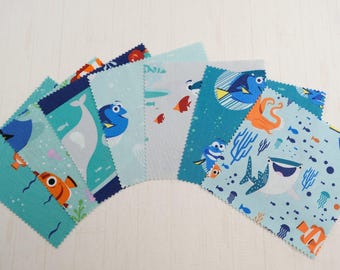 Le monde de Nemo/Dory Disney - Collection sélectionnée - Prédécoupés - Lot de breloques - Carrés de 5 po. - 100 % coton matelassé - 42 carats