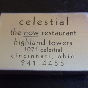 May include: A silver matchbook with black text that reads "celestial the now restaurant highland towers 1071 celestial cincinnati, ohio 241-4455"