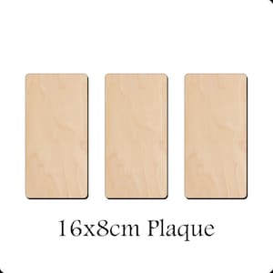 Pode incluir: Três placas de madeira em branco, cada uma medindo 40,6 cm por 20,3 cm. As placas são de madeira clara e têm uma superfície lisa.