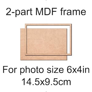 May include: A two-part MDF frame for a 6x4 inch photo. The frame is made of light brown wood and has a rectangular shape. The text "2-part MDF frame" and "For photo size 6x4in 14.5x9.5cm" are displayed in black.