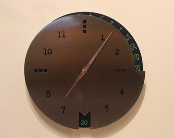 HERMLE Date Horloge murale postmoderne avec calendrier bleu vert