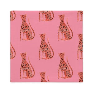 Bold and Playful Pink Pillow Cover with Orange Cartoon Cheetahs Print - Perfect Accent for a Fun and Vibrant Room!