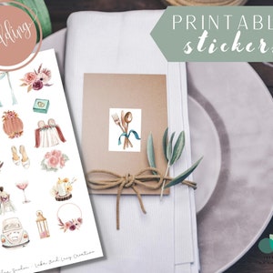 May include: Printable wedding stickers featuring watercolor illustrations of a wedding arch, flowers, a cake, a car, a lantern, and more. The stickers are on a white sheet with the text "wedding" in a pink circle at the top and "Blog Garden - Laka and Lucy Creative" at the bottom.