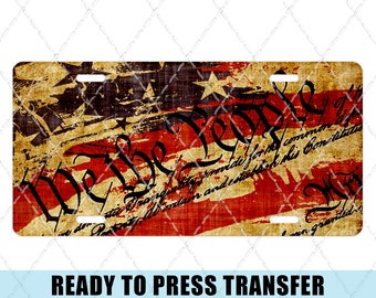 May include: A red, white, and blue American flag with a distressed, vintage look. The flag is overlaid with the text "We the People" from the preamble to the United States Constitution.