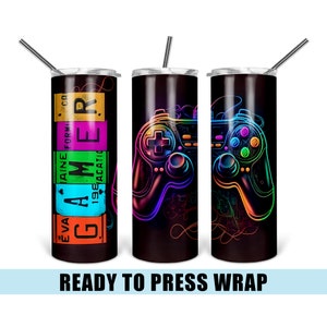 May include: Three sublimation tumblers with a black background and a neon-colored video game controller design. The text "GAMER" is on the left tumbler.
