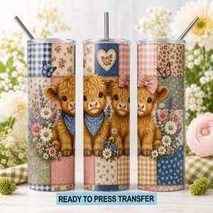 May include: Three cylindrical tumblers with metal straws featuring a patchwork design of highland cows, butterflies, flowers, hearts, and gingham patterns. The tumblers display a repeating motif of brown furry calves with blue bandanas and pink bows.