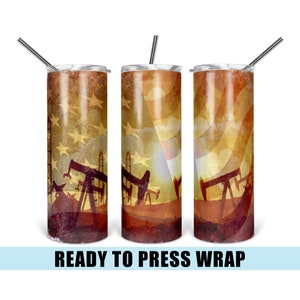 May include: Three stainless steel tumblers with lids and straws. Each tumbler features a distressed design with oil derricks, stars, and a sunset-like background. The phrase "READY TO PRESS WRAP" is printed at the bottom.
