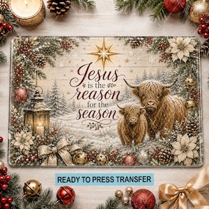 May include: A rectangular decorative transfer featuring a Highland cow and calf in a snowy forest. The text reads Jesus is the reason for the season, centered beneath a gold star. The border includes pine branches, poinsettias, and ornaments.