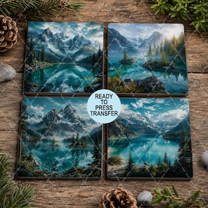 May include: Four square coasters featuring mountain lake landscapes with snow-capped peaks, evergreen forests, and turquoise water. A circular white label in the center displays the black text READY TO PRESS TRANSFER. The designs are detailed.