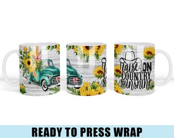 May include: A sublimation design for a white ceramic mug featuring a green vintage pickup truck with sunflowers and the text "Raised on Country Sunshine".