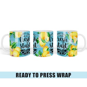 May include: A sublimation design for a white ceramic mug featuring a blue background with lemons and the text "Every day is a fresh start".