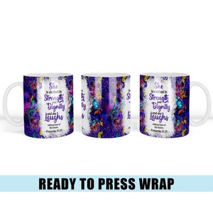 May include: A white ceramic mug with a purple and blue background featuring a butterfly design and the text "She is clothed in Strength and Dignity and she Laughs without fear of the future. -Proverbs 31:25"