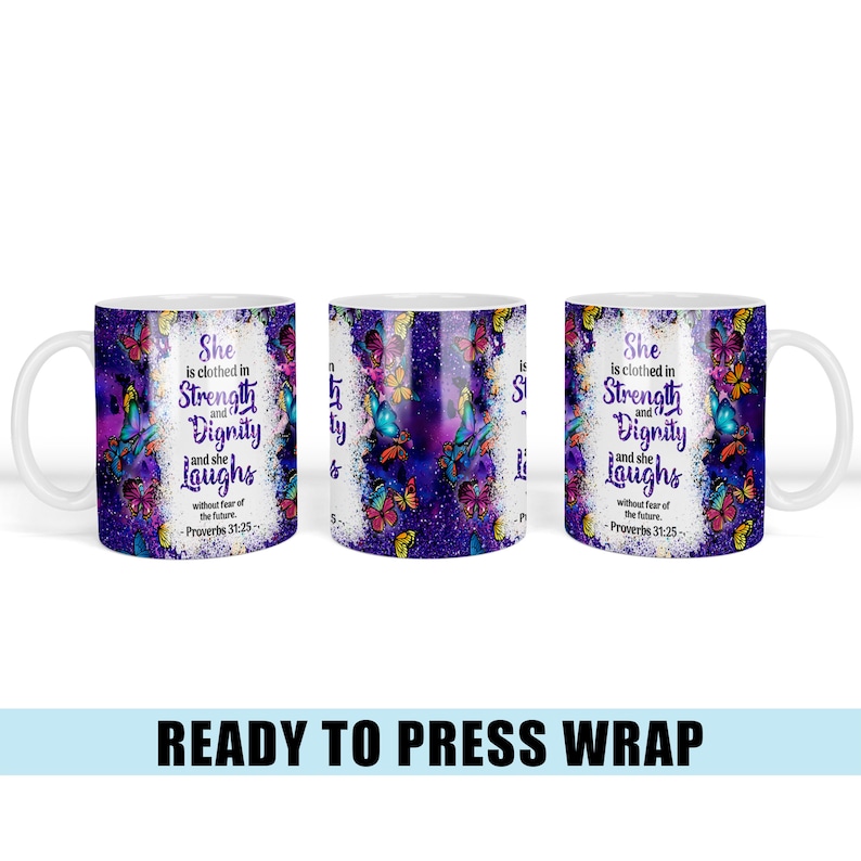 May include: A white ceramic mug with a purple and blue background featuring a butterfly design and the text "She is clothed in Strength and Dignity and she Laughs without fear of the future. -Proverbs 31:25"