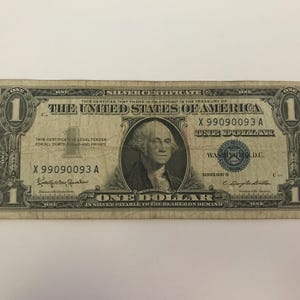 Vintage 1957 Blue Seal Unique Serial Number Silver Certificate One Dollar Bill. Rare, cool, unique, and collectible currency.
