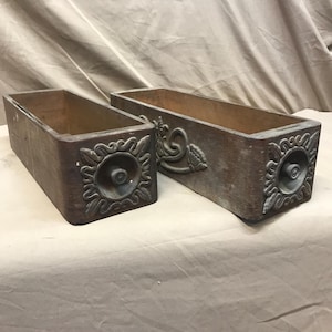Pair of early century wooden treadle sewing machine drawers. Vintage sewing machine drawers.