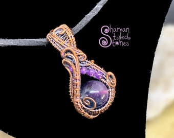 Fluorite bead, shaman styled in oxidized copper and accented with amethyst