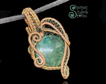 Moss Agate round, shaman styled in oxidized copper