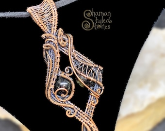 Arfvedsonite Astrophyllite bead pendant, shaman styled in oxidized copper