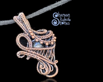 Arfvedsonite bead, shaman styled in oxidized copper