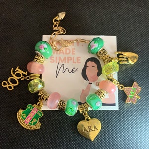 Gold Pink and Green Charm bracelet